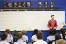 teacher and students in music class